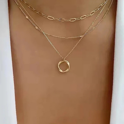Gold necklace with chain and pendant in vintage style