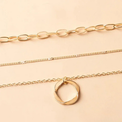 Gold necklace with chain and pendant in vintage style